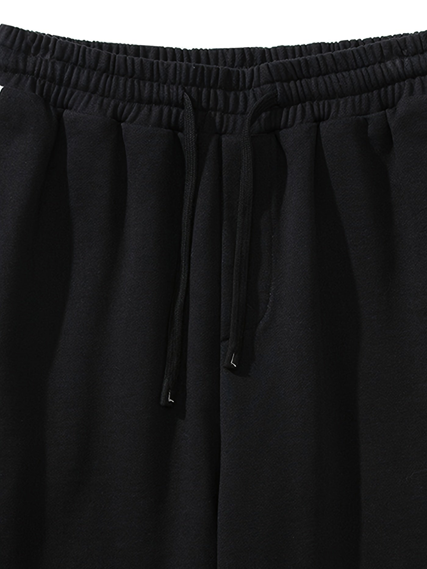 Pantalón corto amplio con rayas y estampado gráfico con bolsillos, cintura elástica y cordón