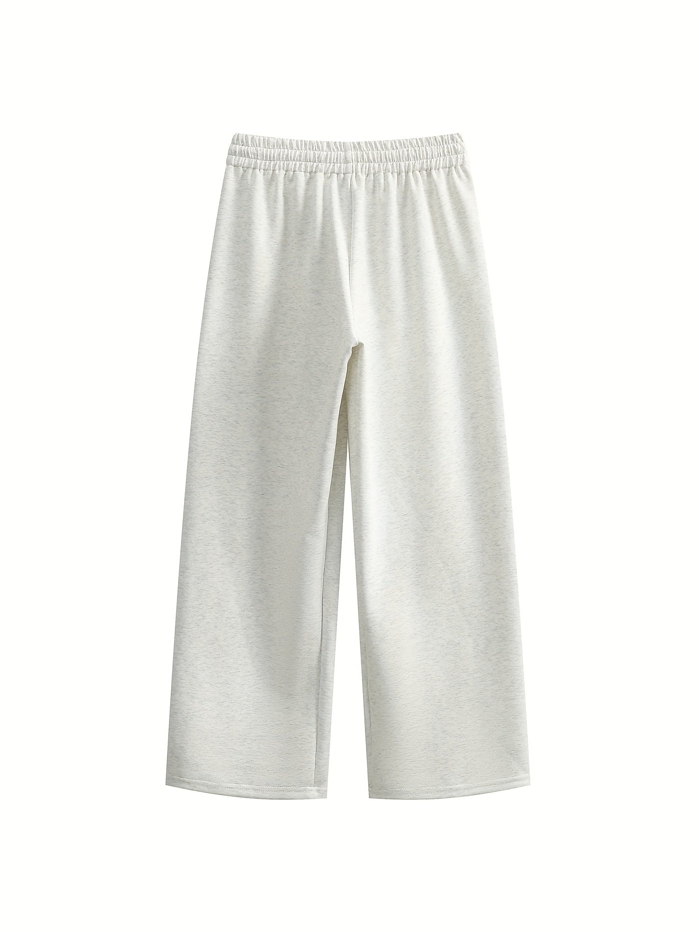 Light and breathable casual jogging in cotton blend with embroidered pattern.
