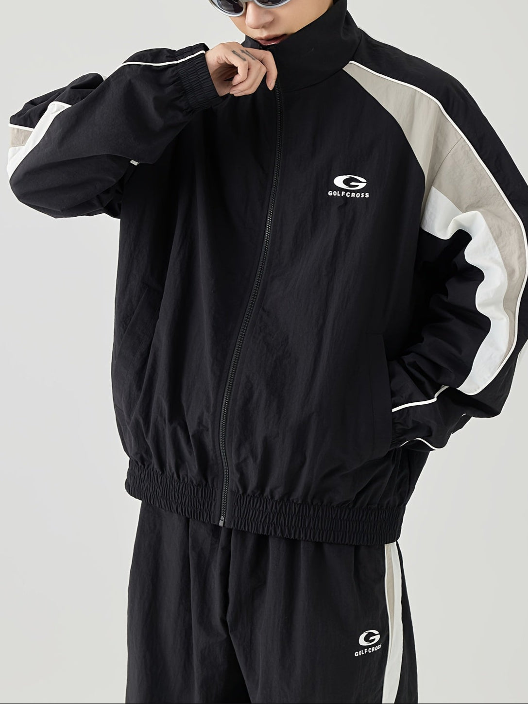 Chaqueta casual con mangas raglán rayadas en el lado con cuello alto, para primavera y otoño