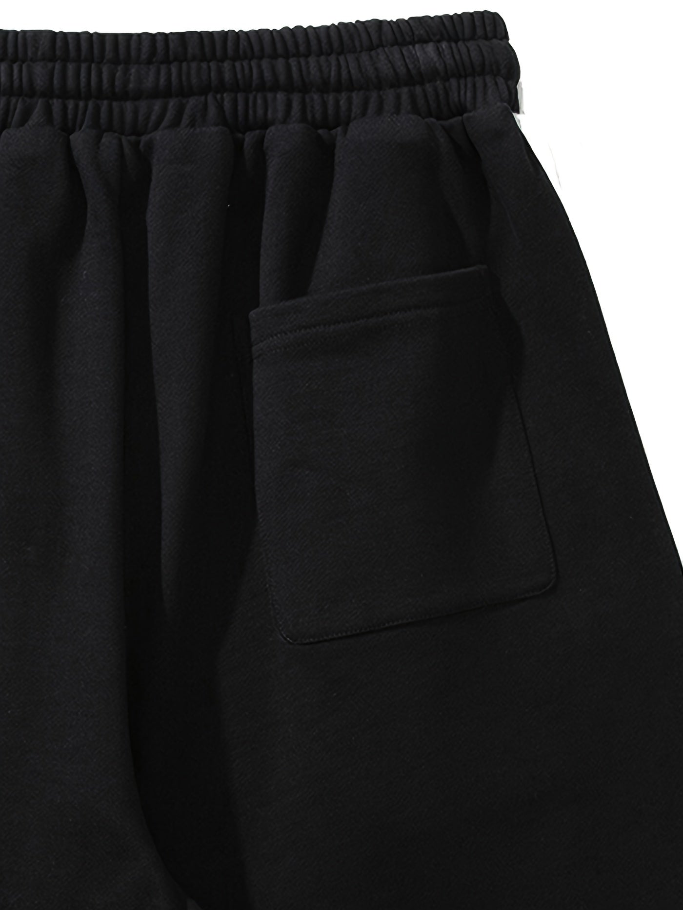 Pantalón corto amplio con rayas y estampado gráfico con bolsillos, cintura elástica y cordón