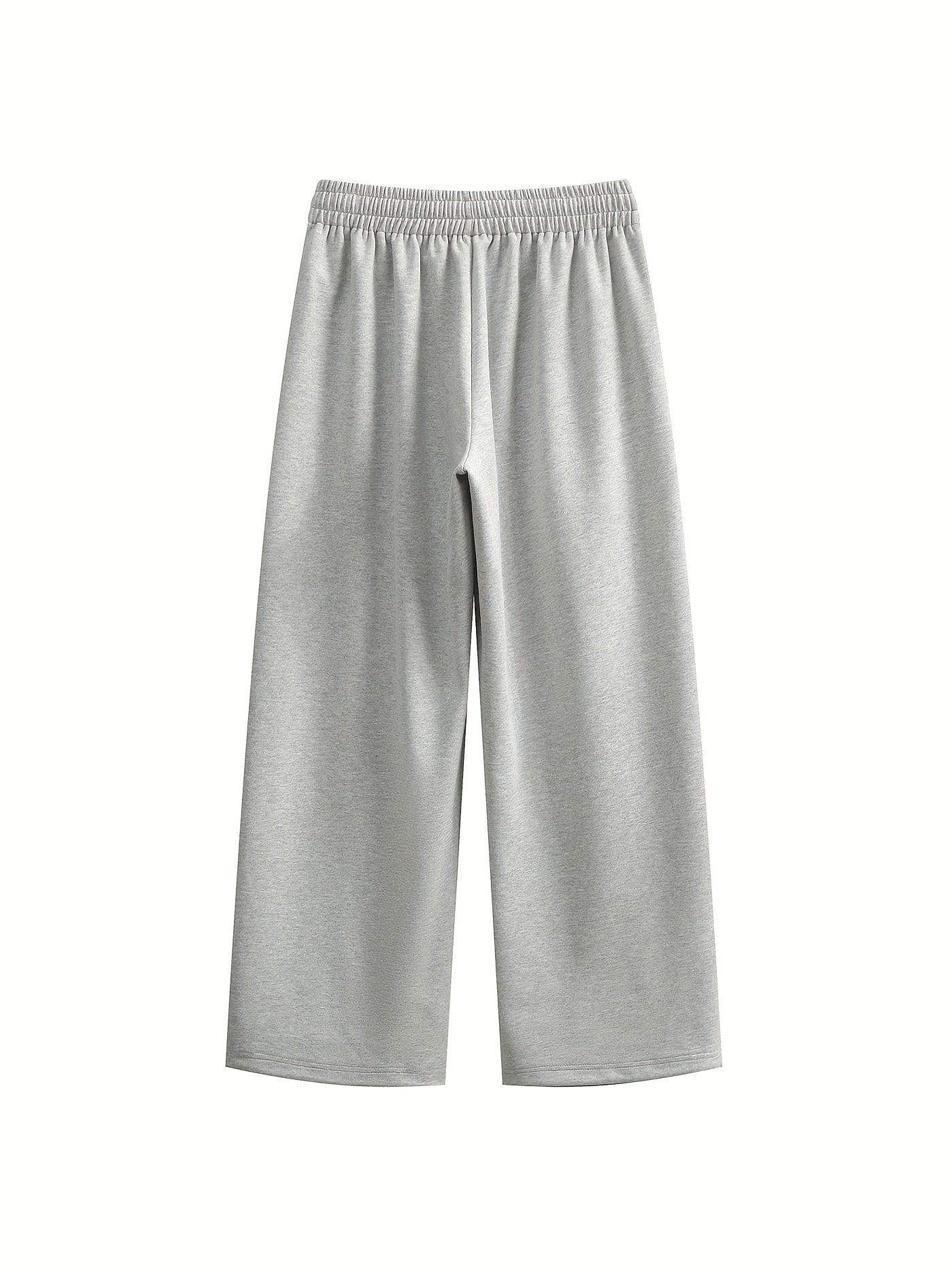 Light and breathable casual jogging in cotton blend with embroidered pattern.